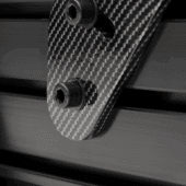 Carbon fibre mounting bracket with bolts on F-GT Elite 160 Ferrari Edition rig