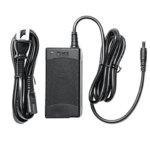 Simagic power supply unit with AC cable and DC connector showing complete adapter setup for sim racing hardware