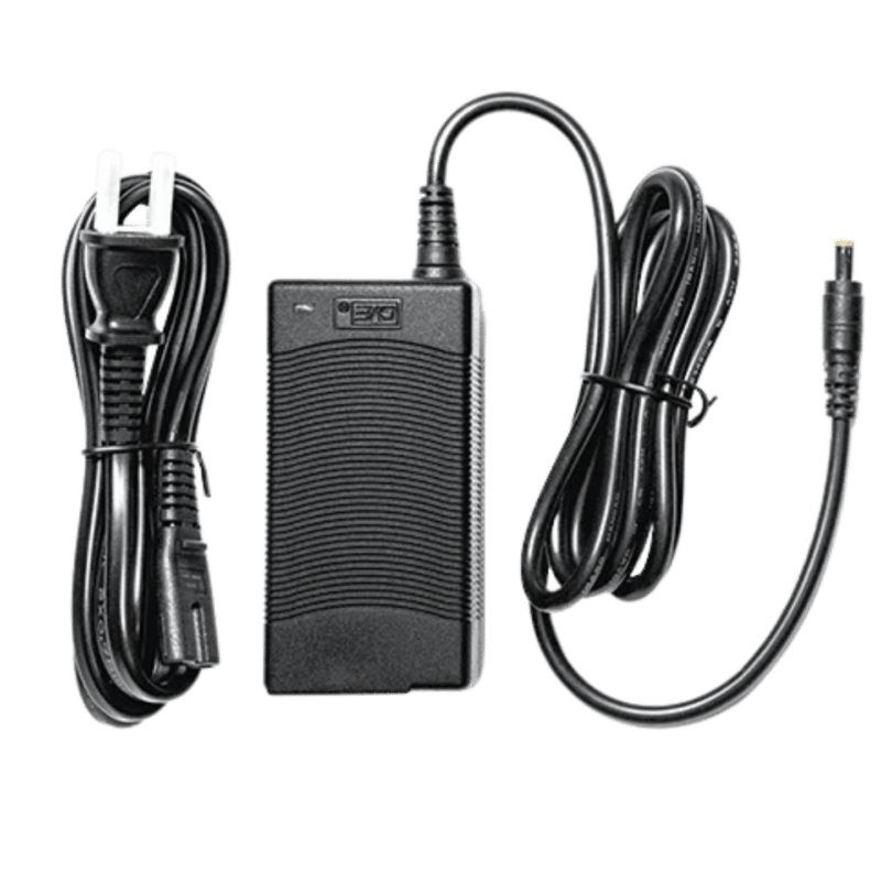 Simagic power supply unit with AC cable and DC connector showing complete adapter setup for sim racing hardware