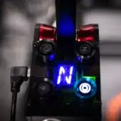 Close-up of Simagic Q1 shifter showing LED gear display and control buttons