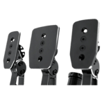 Angled close-up of Simagic P1000 flat pedal plates mounted on pedals showing slim profile and mounting hardware