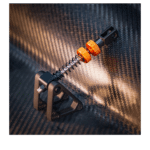 Asetek La Prima brake spring and damper assembly for adjustable resistance and realistic pedal feedback
