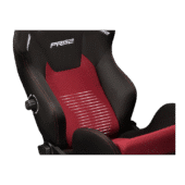 Close-up of Next Level Racing PRS2 reclining sim racing seat showing red breathable fabric, ergonomic lumbar support, and side adjustment knob for backrest recline.