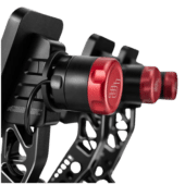 Simagic P-HPR GT haptic reactor mounted on pedals showing red motor housing and tactile feedback system