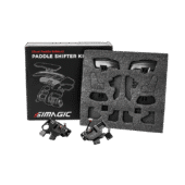Simagic Paddle Shifter Kit (Dual Paddle Edition) shown in retail packaging with foam insert and full assembly kit for premium racing wheels.