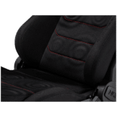 Close-up detail of Next Level Racing ERS3 Haptic Feedback sim racing seat showing breathable fabric and red contrast stitching
