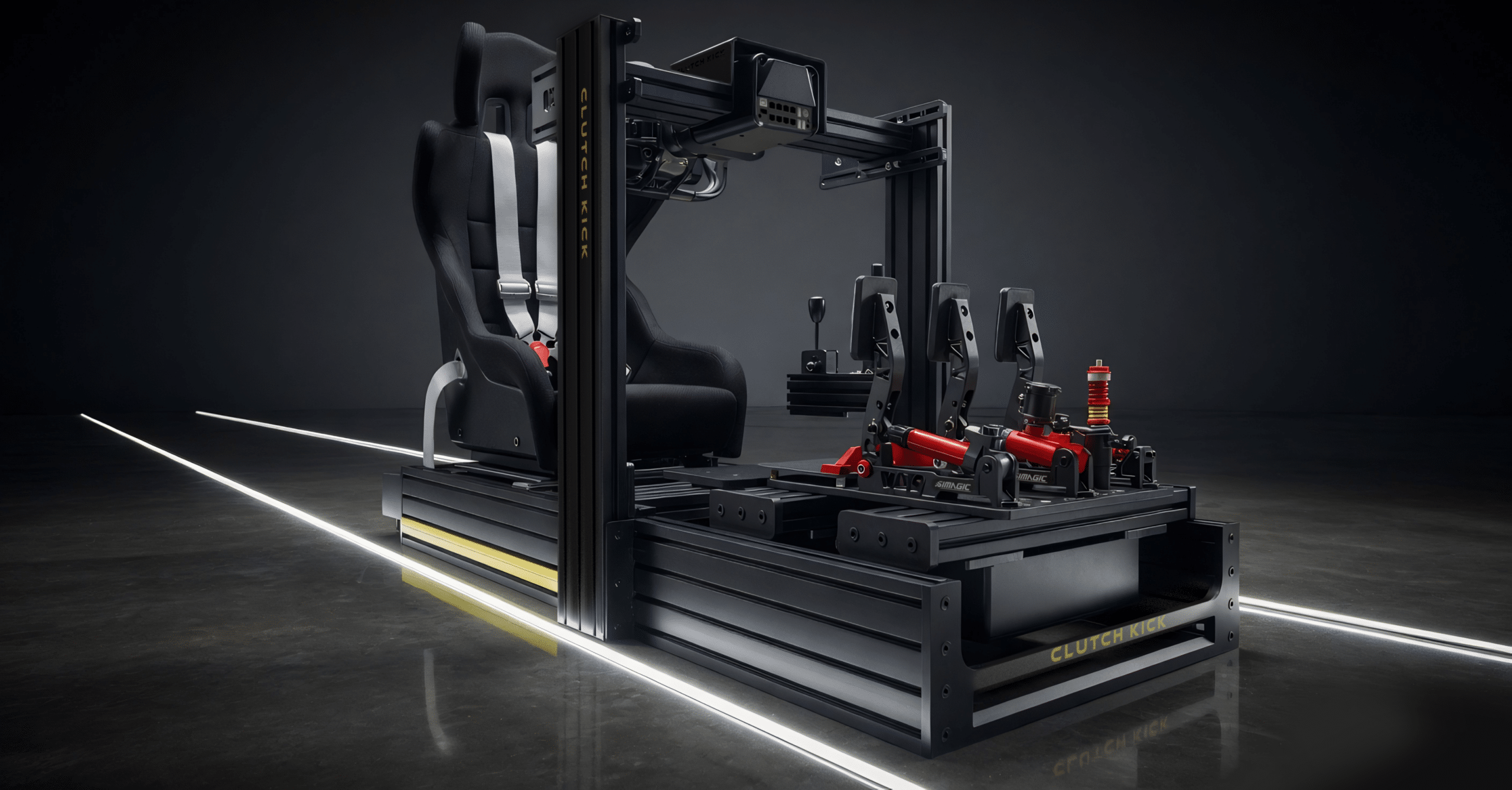 UNiTORQUE racing simulator system in black and yellow configuration